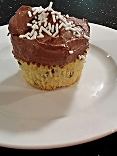 A picture of Chocolate Chip Cupcakes With Chocolate Ganache Frosting.