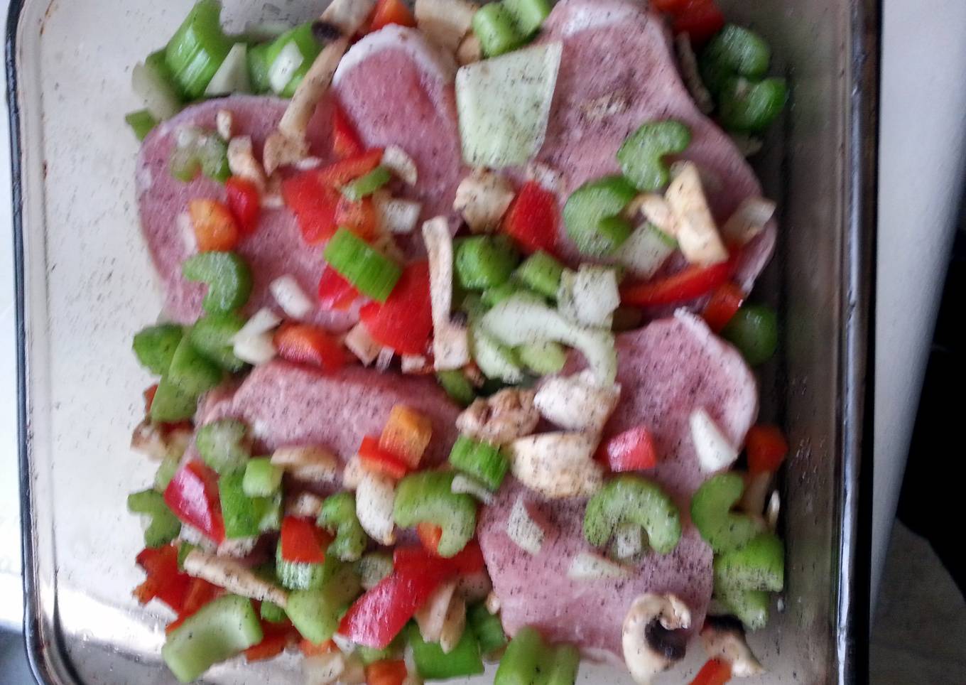 easy pork chops and veggies in a pan