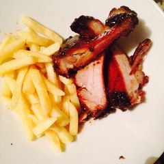 A picture of Barbecue Pork ribs in the oven.