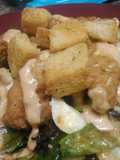 Hot and spicy chicken tenders with tangy sweet salad