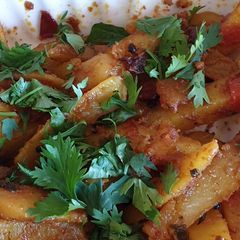 A picture of Dry potatoe curry#cookingwith Tomatoescontest.