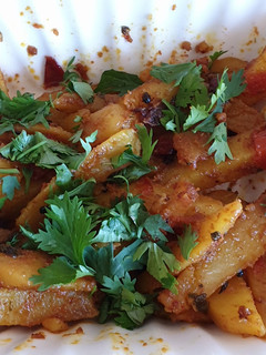 A picture of Dry potatoe curry#cookingwith Tomatoescontest.