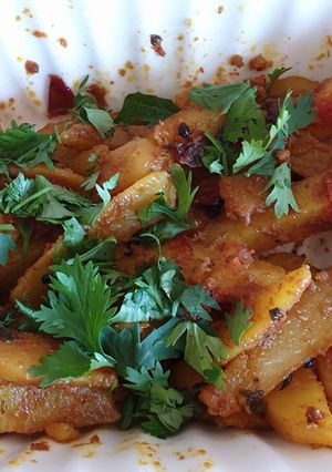 A picture of Dry potatoe curry#cookingwith Tomatoescontest.