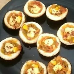 A picture of Bread pizza cups.