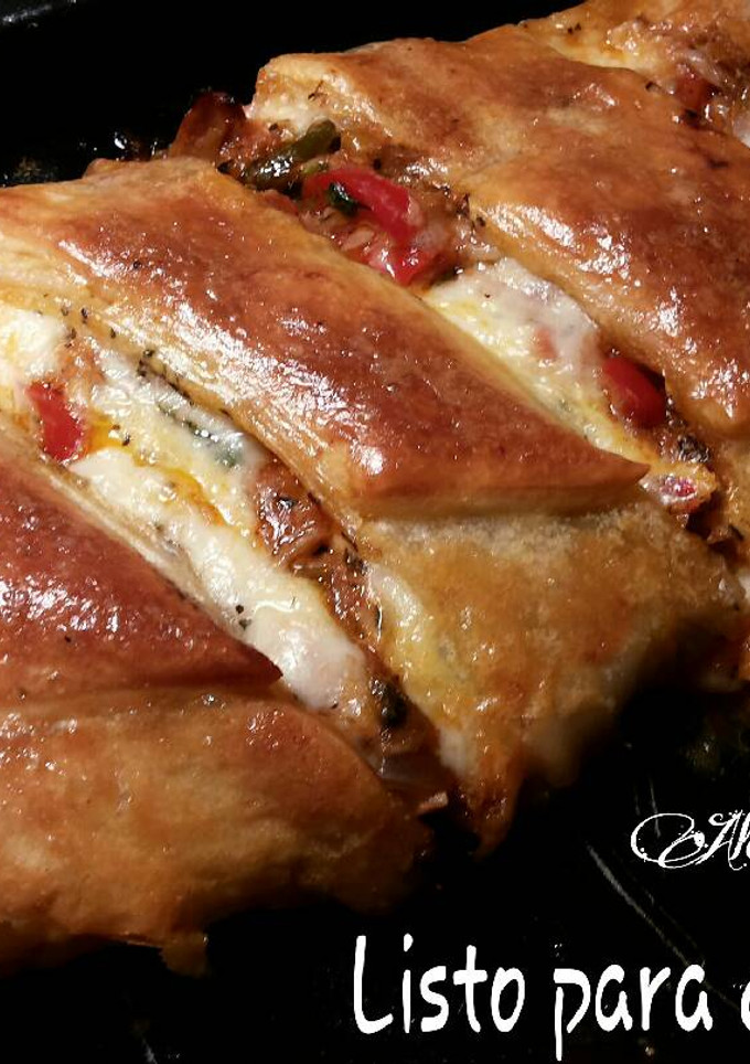 Una foto de Empanada de hojaldre, con atún y mozzarela