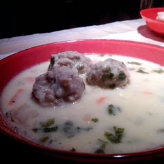 A picture of Meatballs with White Sauce.