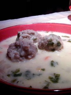 A picture of Meatballs with White Sauce.