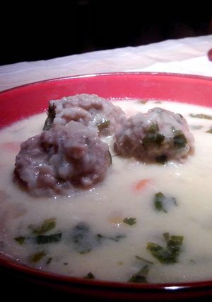 A picture of Meatballs with White Sauce.