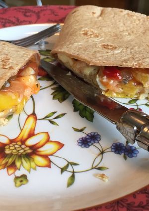 A picture of Mango Salsa, Cheese, And Scrambled Egg Tortilla.