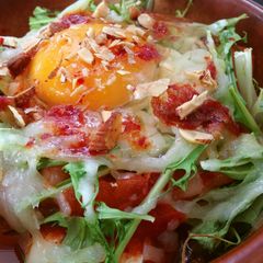 A picture of Kimchi Tofu Gratin with Tomatoes.