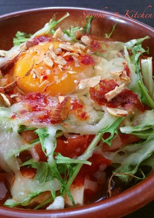 A picture of Kimchi Tofu Gratin with Tomatoes.