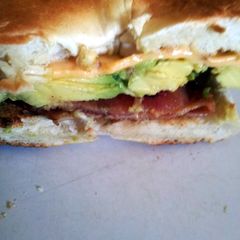 A picture of Avocado, bacon and chedder cheese bagel.