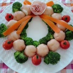 A picture of Cream Cheese and Potatoes Wrapped in Cured Ham Christmas Wreath.