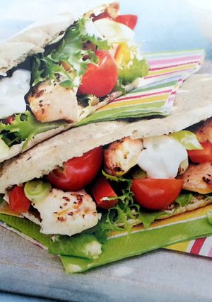 A picture of Greek style chicken pittas.
