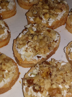 A picture of Goat cheese and walnut crostini.