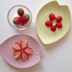 A picture of Sakura and Plum Flowers with Just 3 Strawberries.