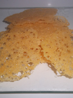 Una foto de Puntilla de parmesano
