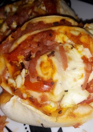 Una foto de Pizza roll - Rollos de pizza