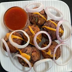 A picture of Pizza cheese balls-Monsoon special.
