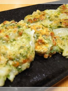 A picture of Sweet Onion and Natto Oyaki (Flat Cakes).