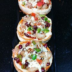 A picture of Open Kidney Beans Macaroni Cheesy Burgers.