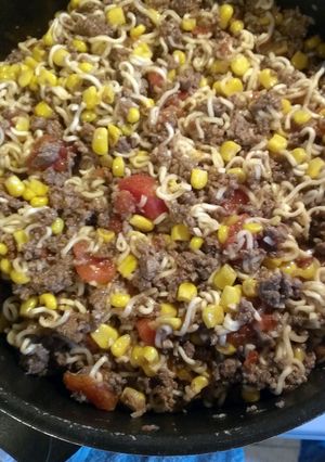 A picture of ground beef curly noodles.