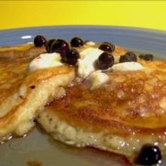 A picture of Lemon Cream Cheese Pancakes with Blueberries.
