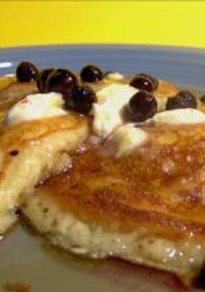 A picture of Lemon Cream Cheese Pancakes with Blueberries.