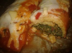 Una foto de Canelones de verdura con salsa blanca y tuco