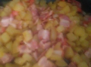 Una foto de Papas con tocino