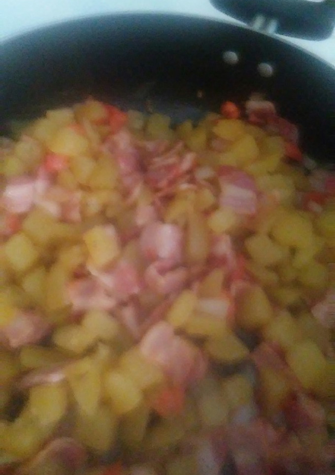Una foto de Papas con tocino