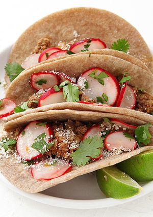 A picture of Duck Tacos, Radish-Lime Salad, Cumin-Roasted Squash.