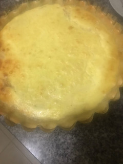 Una foto de Tarta casera de cebolla y queso