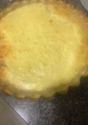 Una foto de Tarta casera de cebolla y queso