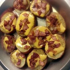 A picture of Baked potato slices.