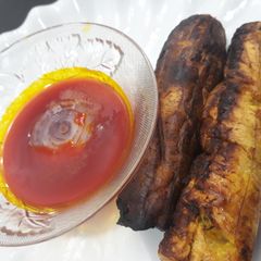 A picture of Roasted plantain with palmoil.