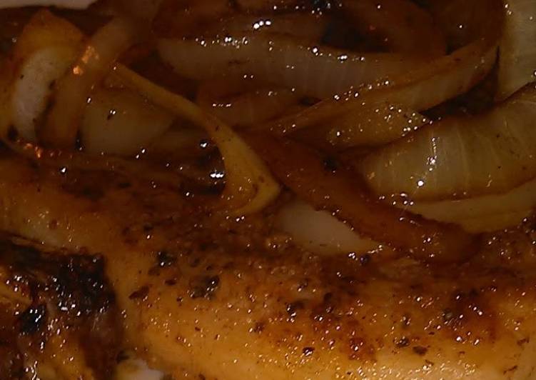 Seared pork chop with onions