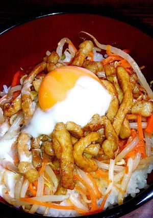A picture of Bibimbap-Style Sweet and Salty Pork and Bean Sprout Namul On Rice.