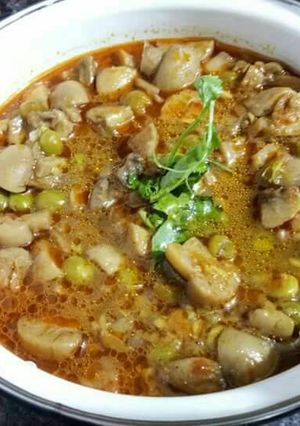 A picture of Mushroom peas curry.