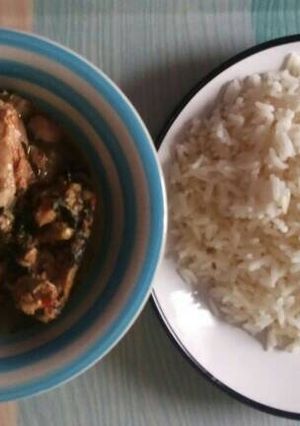 A picture of Rice with chicken pepper soup.