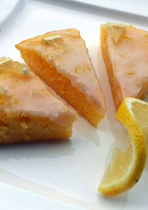 A picture of Lemon Brownies Topped with Lemon Icing Glaze.