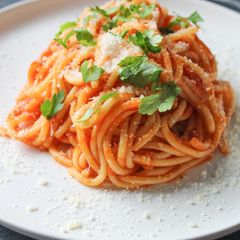 A picture of Spaghetti with homemade oregano tomato sauce.