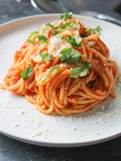 A picture of Spaghetti with homemade oregano tomato sauce.