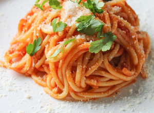 A picture of Spaghetti with homemade oregano tomato sauce.