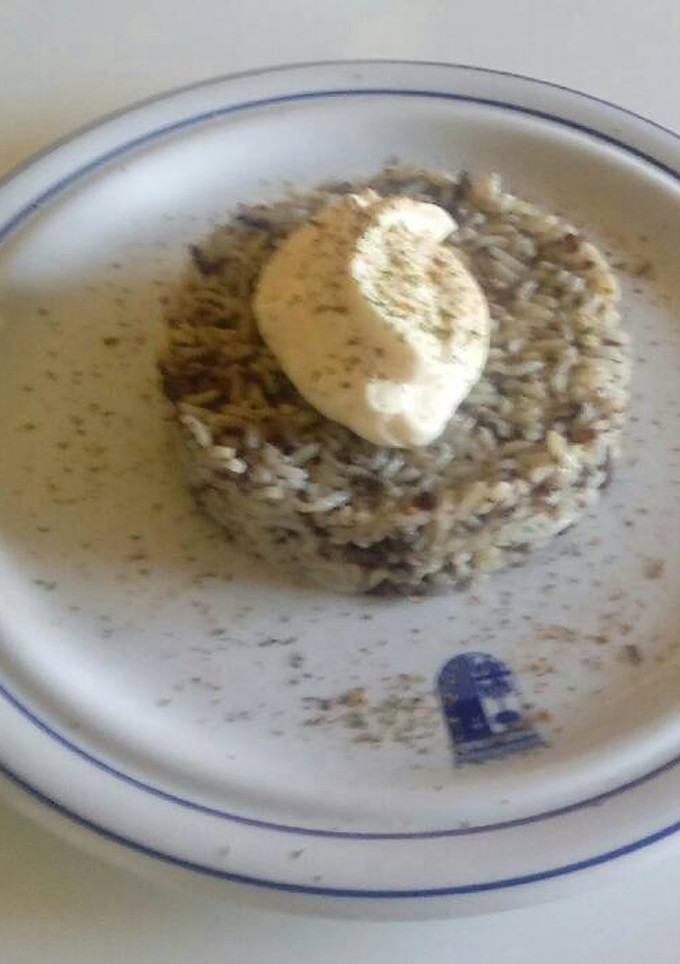 Una foto de Arroz con morcilla