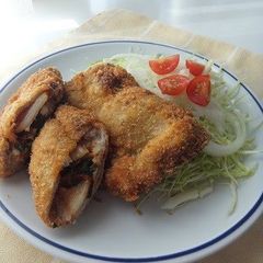 A picture of Pork Cutlets with Kimchi and Cheese.