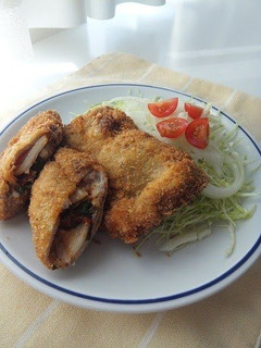 A picture of Pork Cutlets with Kimchi and Cheese.