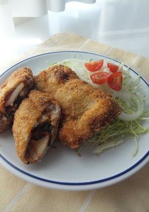 A picture of Pork Cutlets with Kimchi and Cheese.