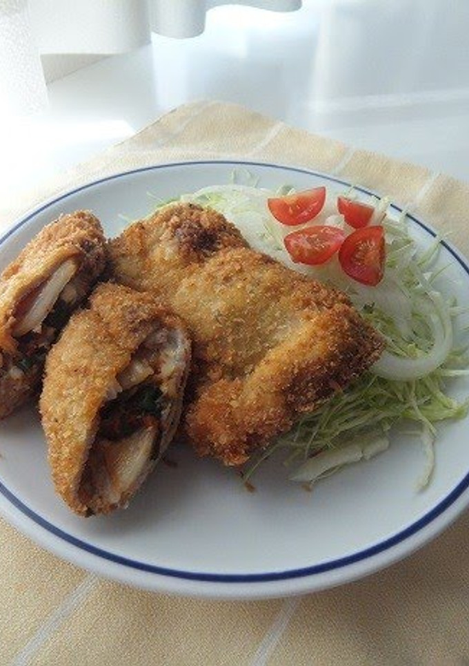 A picture of Pork Cutlets with Kimchi and Cheese.