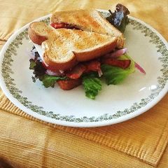 A picture of Grilled Chicken Swiss & Bacon Club Sandwich.